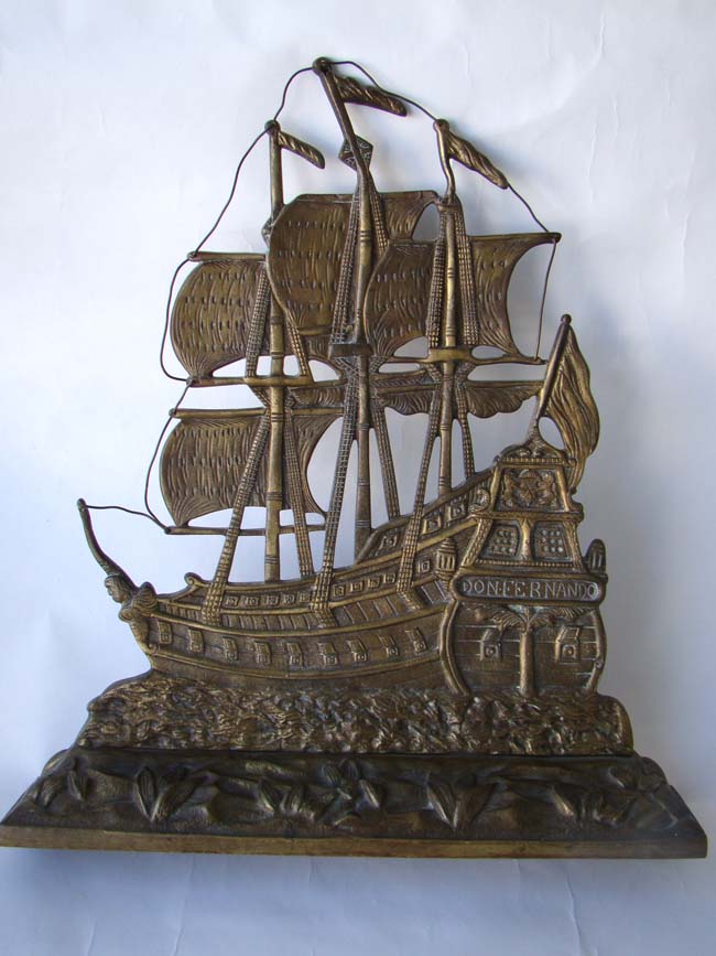 A cast iron bronze finished Ship door stop with the name 'Don Fernando' circa 1920
